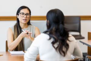 A female boss talking to her female employee